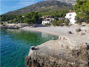 Apartments Carić Ivan Dolac - island Hvar, Stone house, Size 100.00 m2, Airline distance to the sea 50 m