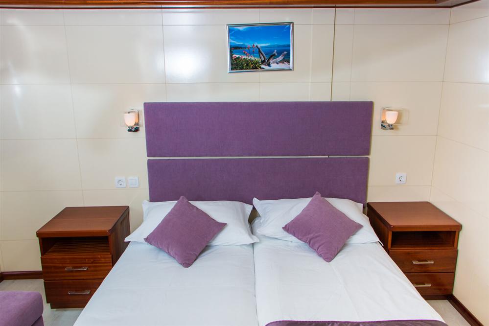 Futura-luxury-ship-twin-beds-room