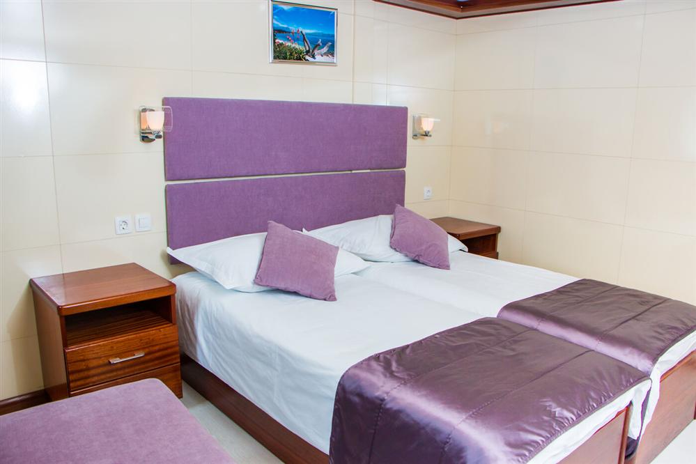 Futura-luxury-ship-twin-beds-room