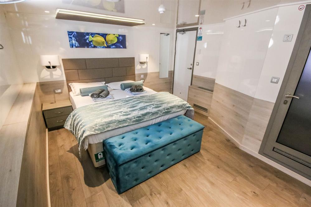 Nautilus-small-luxury-cruise-ship-double-cabin-marital-bed