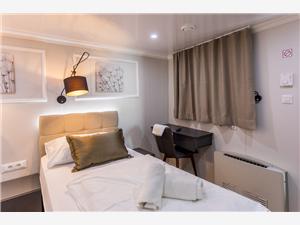 Arca-luxury-cruise-ship-bedroom-single-bed