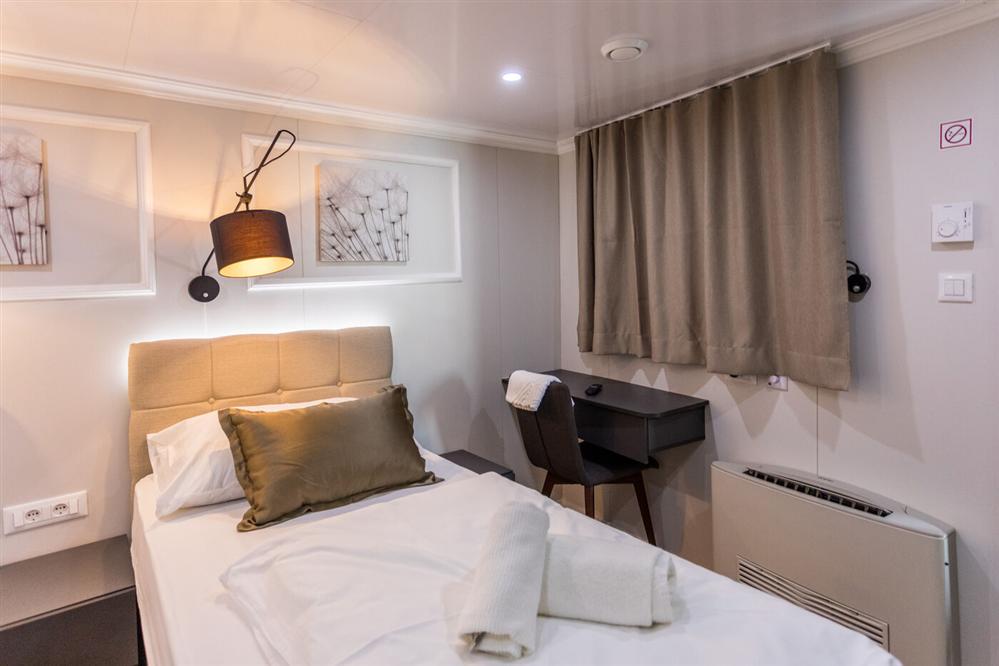 Arca-luxury-cruise-ship-single-bed-cabin