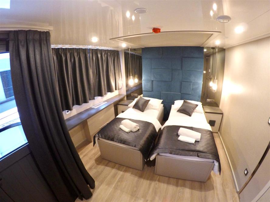 Luxury-small-cruise-ship-Rhapsody-double-cabin-twin-beds