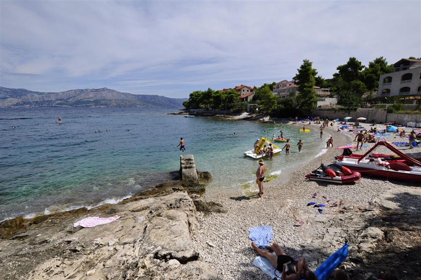 Apartmaji Postira uz more