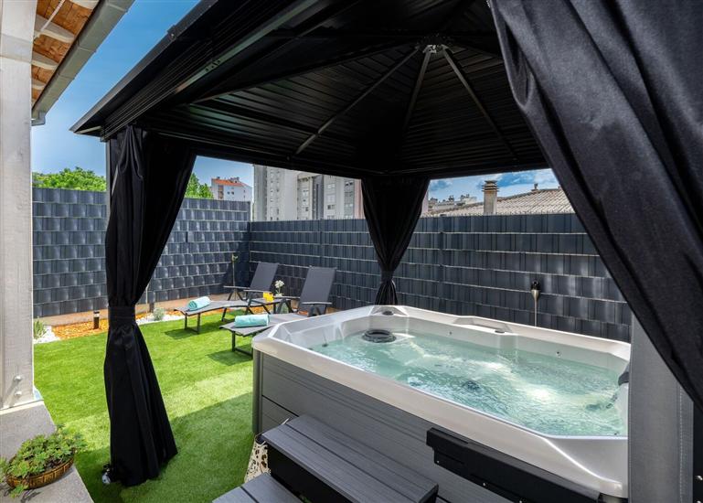 House Cute house with jacuzzi