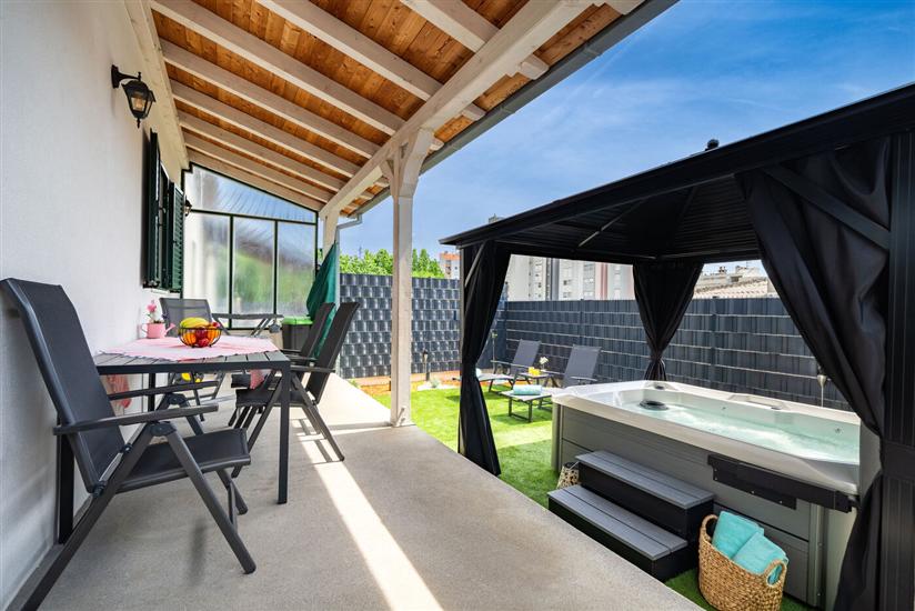 House Cute house with jacuzzi