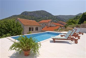 Find stone houses in town centers or overlooking the sea in Dalmatia