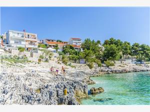 Beachfront accommodation Split and Trogir riviera,Book  Nives From 128 €