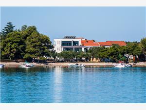 Apartmány Punta Sukosan (Zadar), Rozloha 130,00 m2, Vzdušná vzdialenosť od mora 5 m