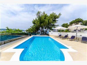 Appartementen Edita Trogir, Kwadratuur 35,00 m2, Accommodatie met zwembad, Lucht afstand tot de zee 20 m