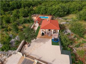 Alloggi con piscina Riviera di Spalato e Trogir (Traù),Prenoti  kuća Da 142 €