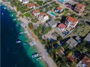 Huis Osti Rogoznica, Kwadratuur 80,00 m2, Accommodatie met zwembad, Lucht afstand tot de zee 60 m