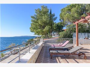 Beachfront accommodation Split and Trogir riviera,Book  Helli From 34 €